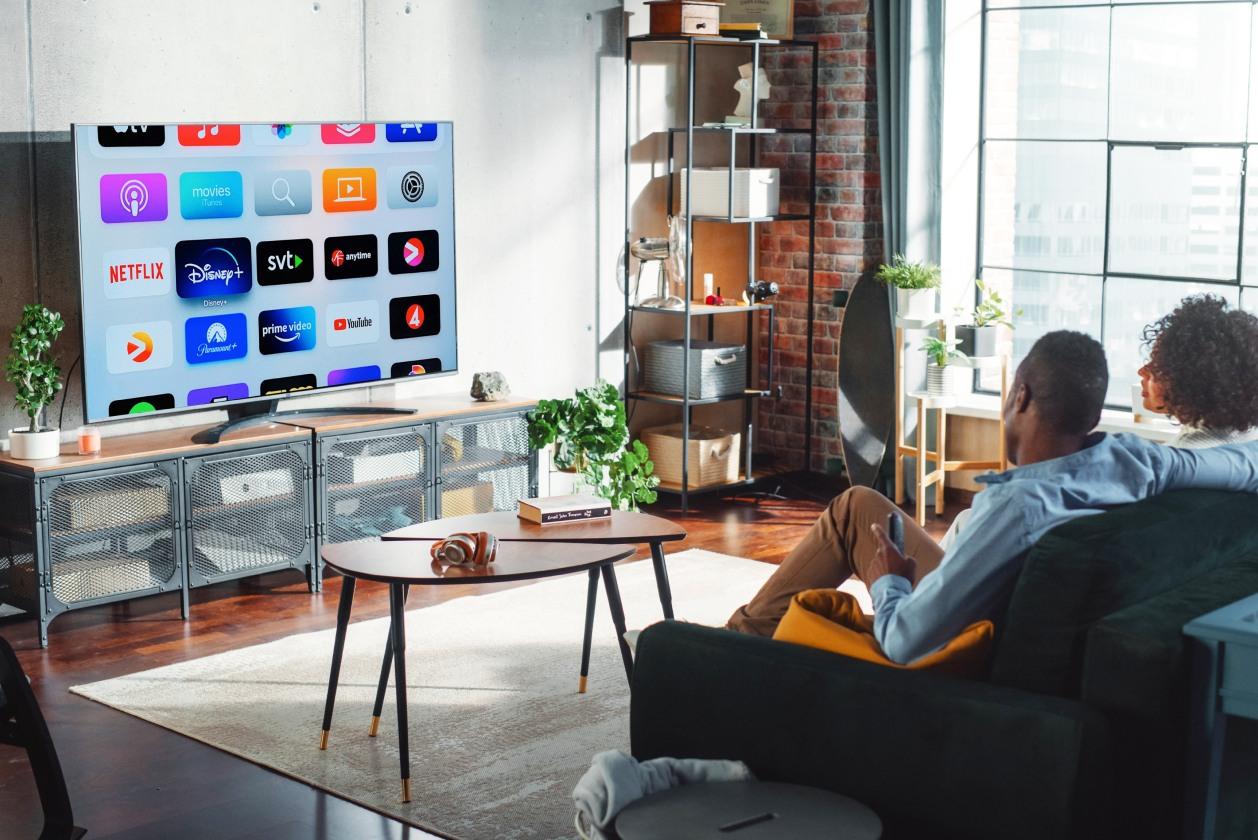 Family enjoying entertainment at home